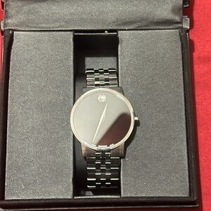 Movado Museum Classic watch stainless steel and link bracelet w/black dial.